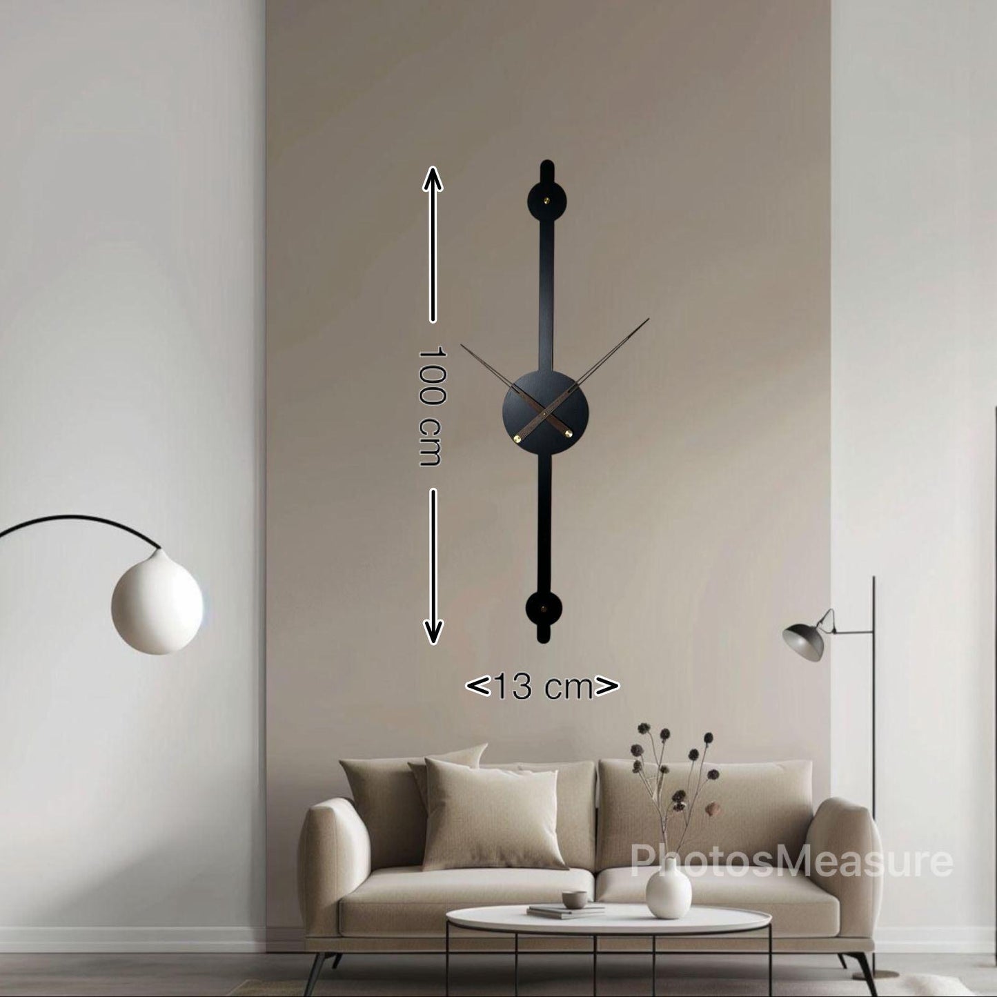 ساعة حائط معدنية سوداء طولية  بتصميم عصري 100 سم × 13 سم